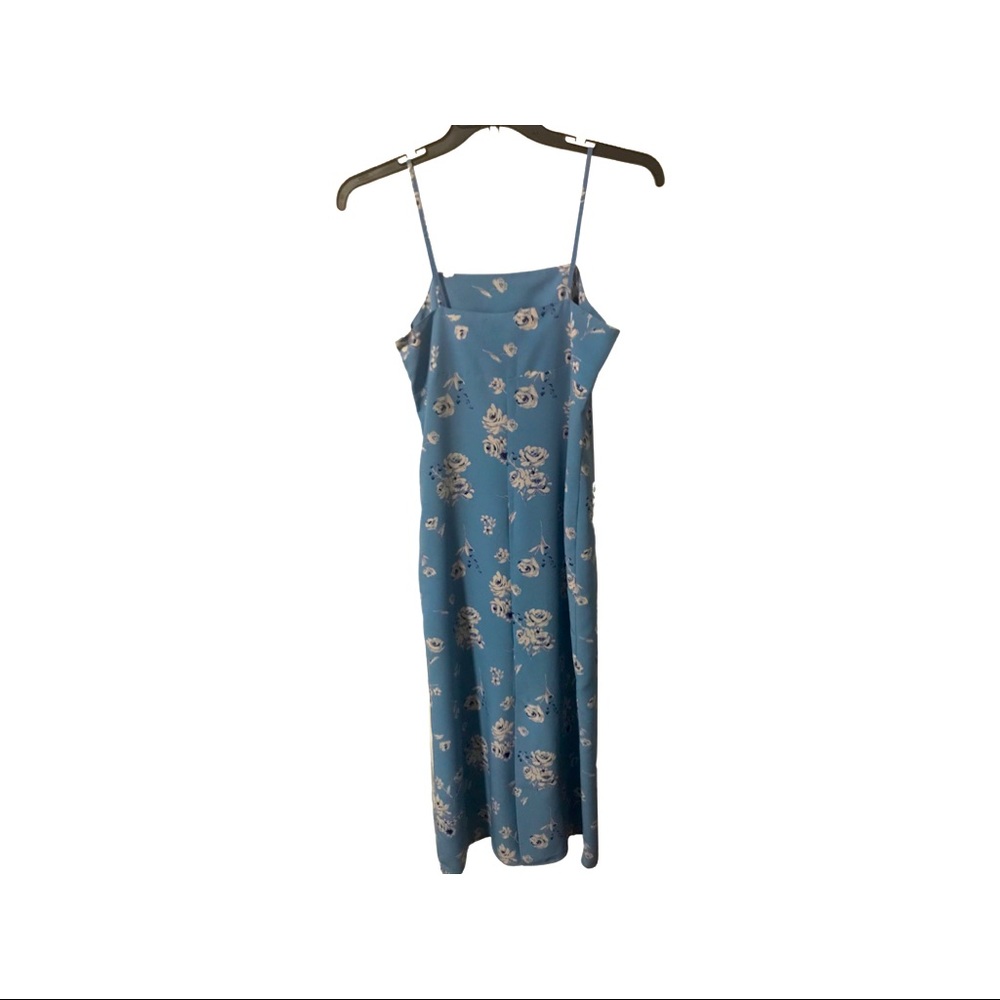 Light Blue with some beautiful unique flower designs, 100% polyester